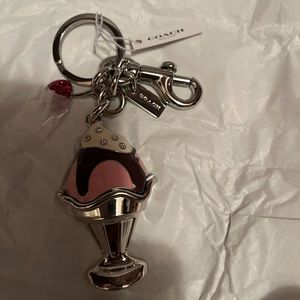 Coach charm
